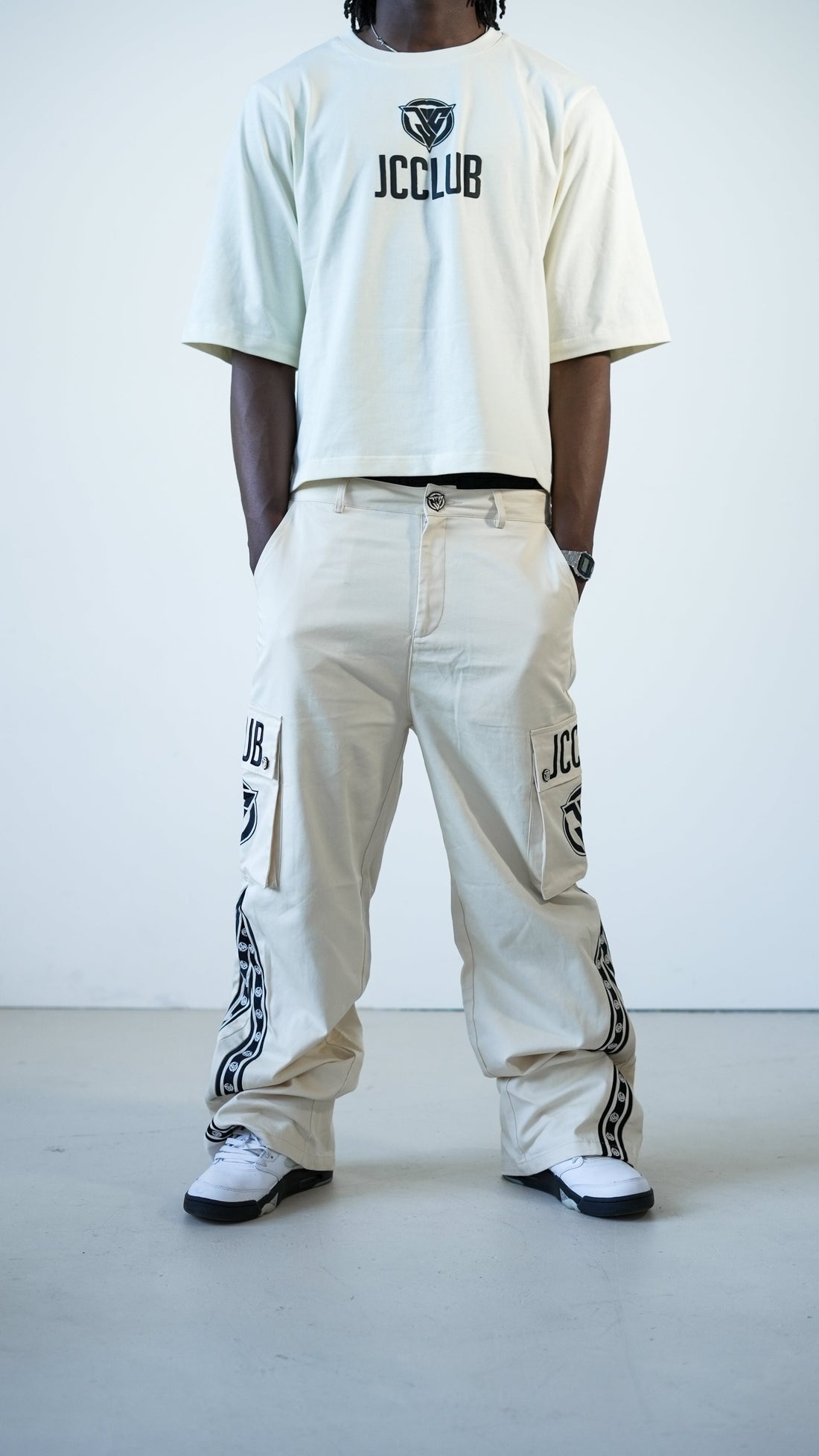 JCCLUB Signature T-Shirt styled with cargo pants — UK streetwear outfit 2026