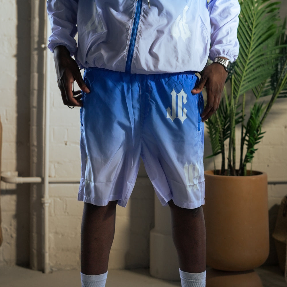 
                      
                        Gradient Windbreaker Shorts
                      
                    