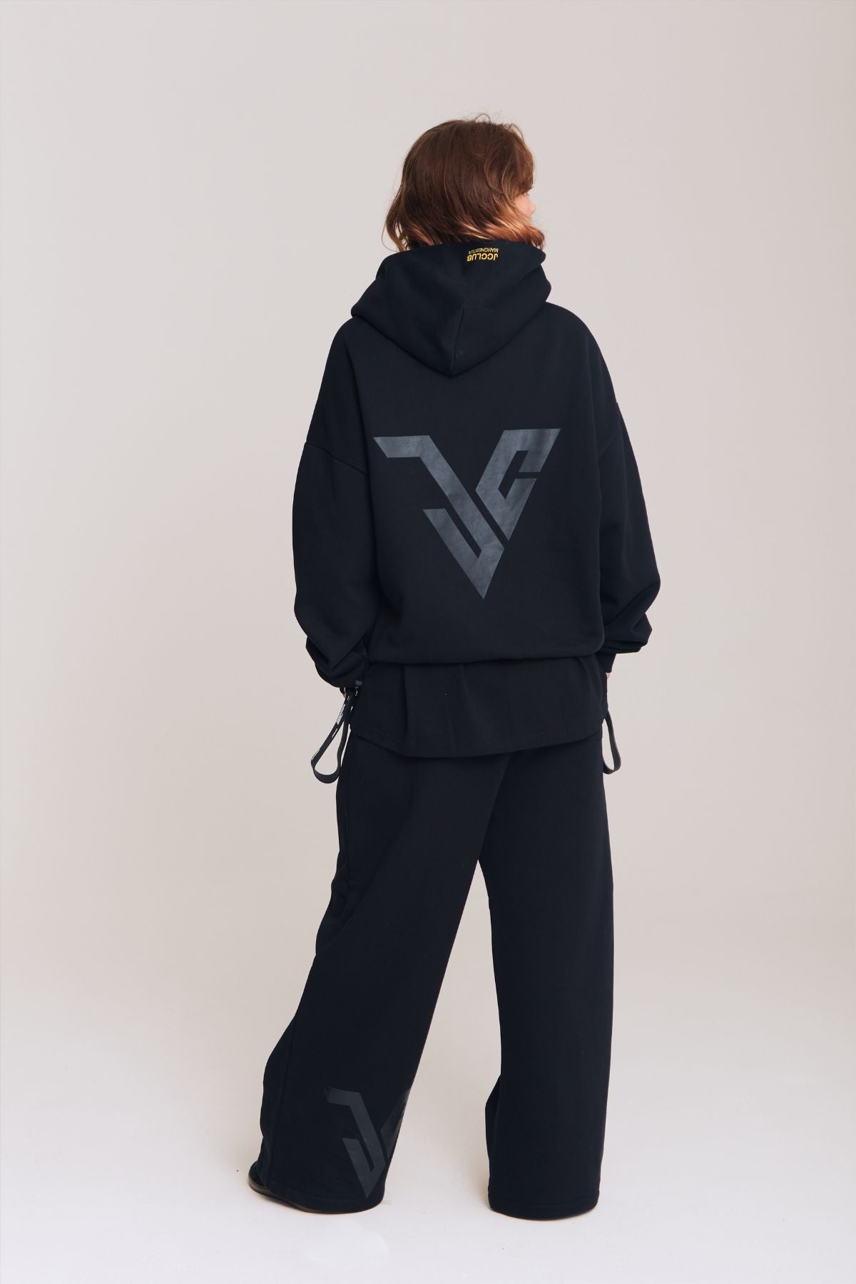 Woman wearing the black hoodie