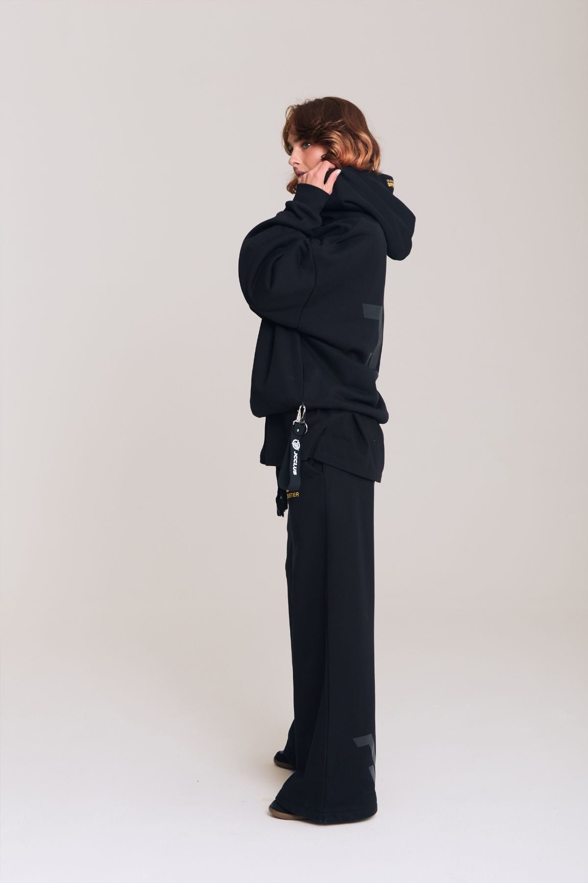 Woman wearing the black hoodie