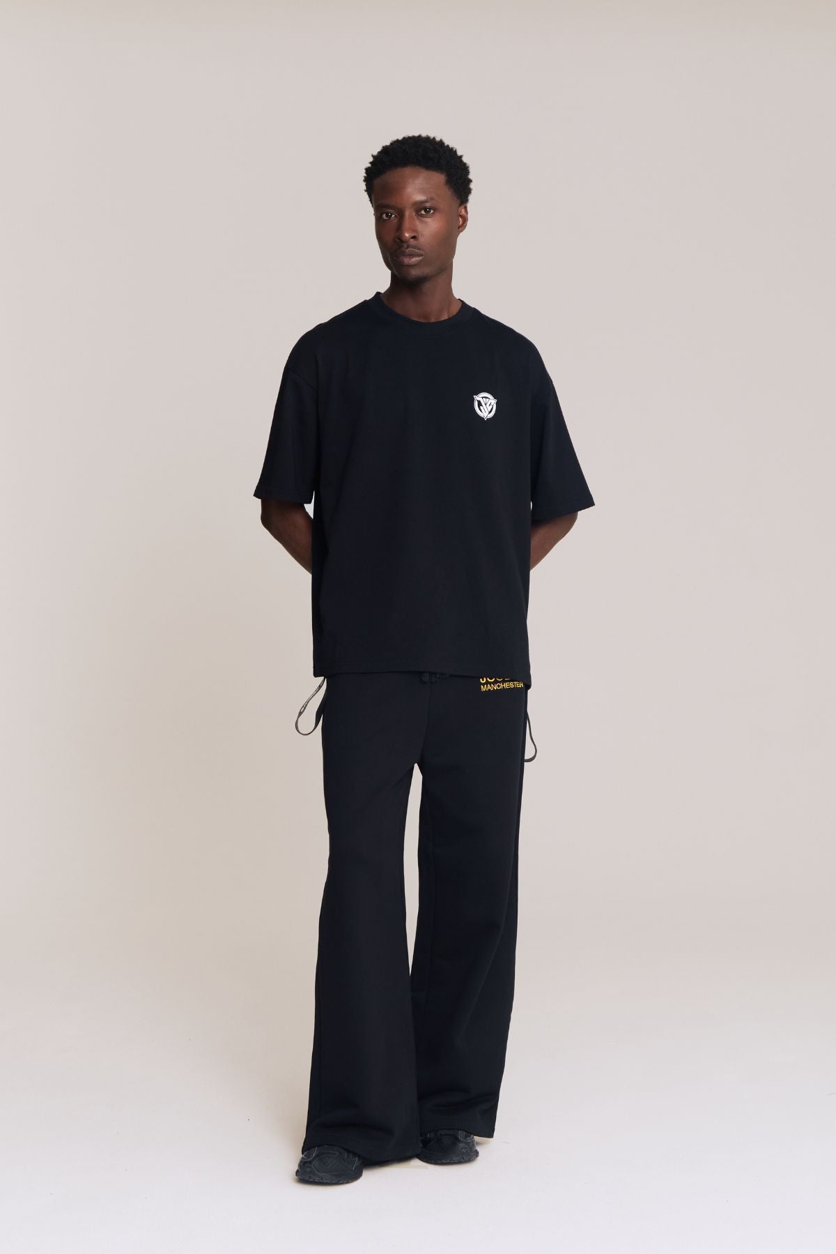 Man wearing the black shirt