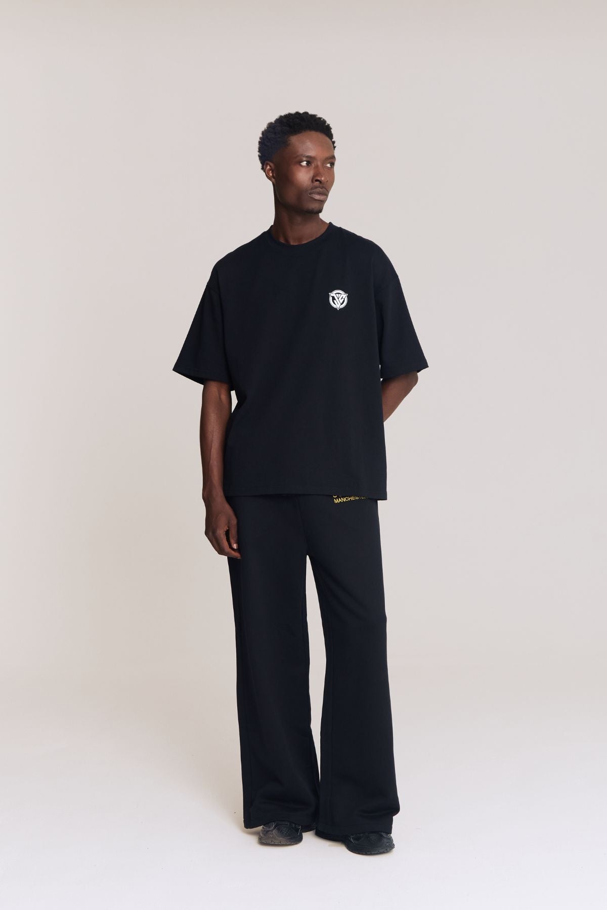 Man wearing the black shirt