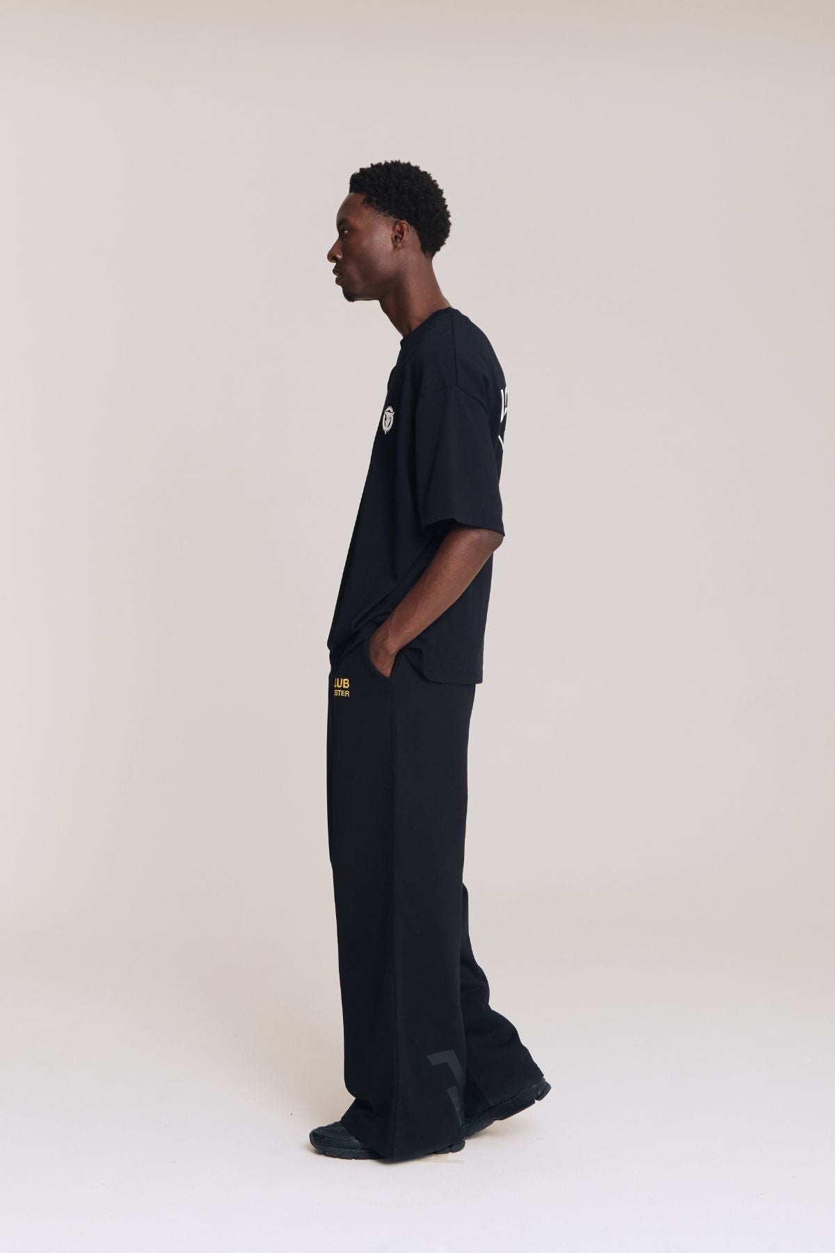 Man wearing the black shirt