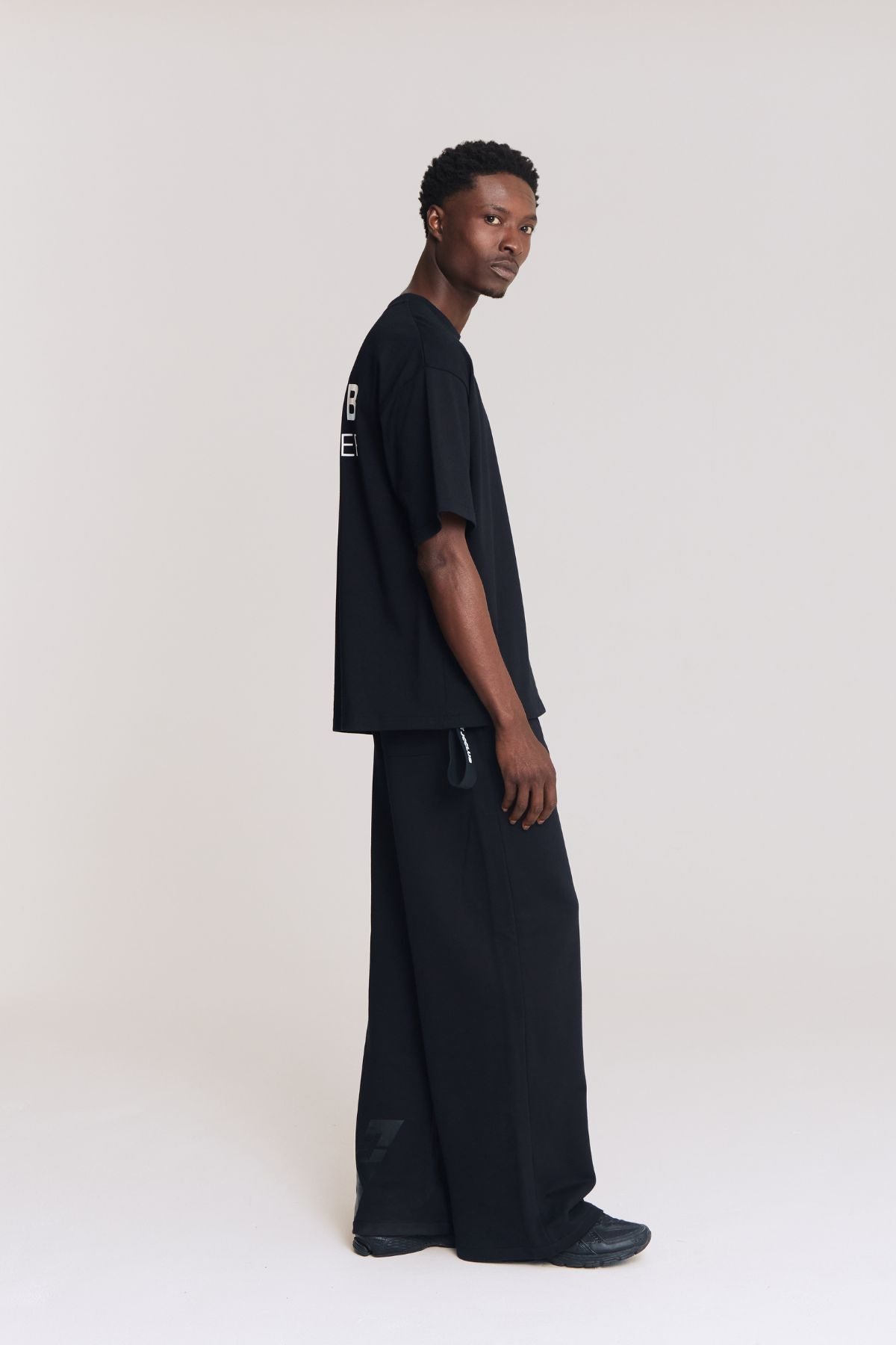 Man wearing the black shirt