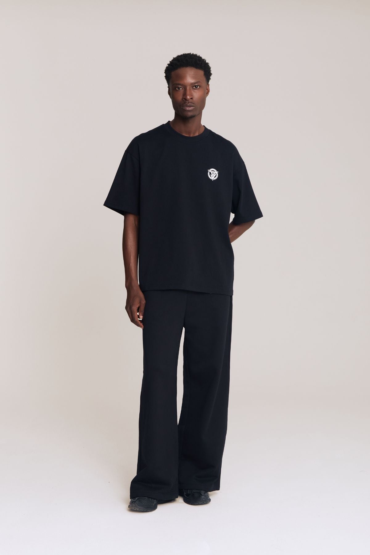Man wearing the black shirt