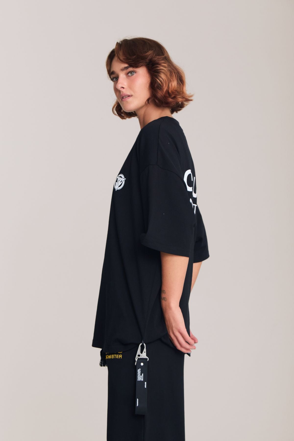Woman wearing the black shirt