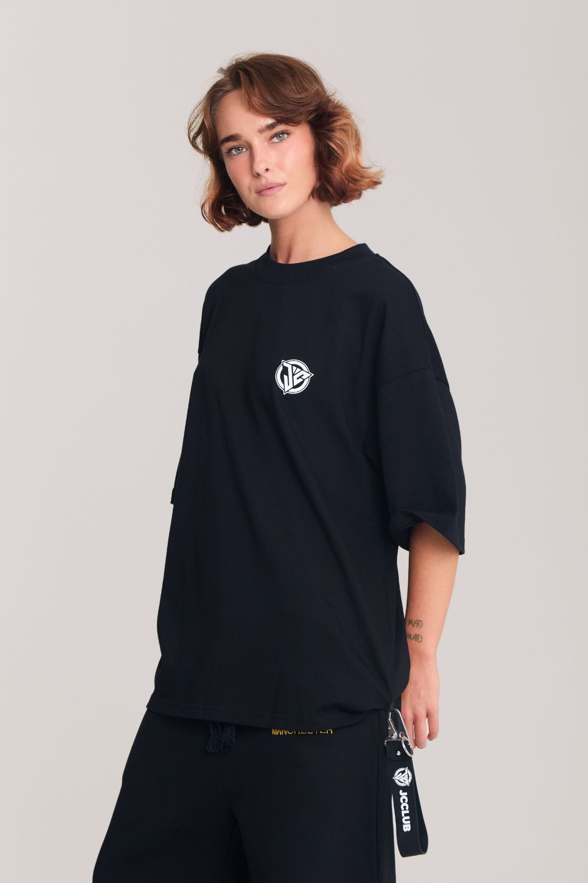 Woman wearing the black shirt