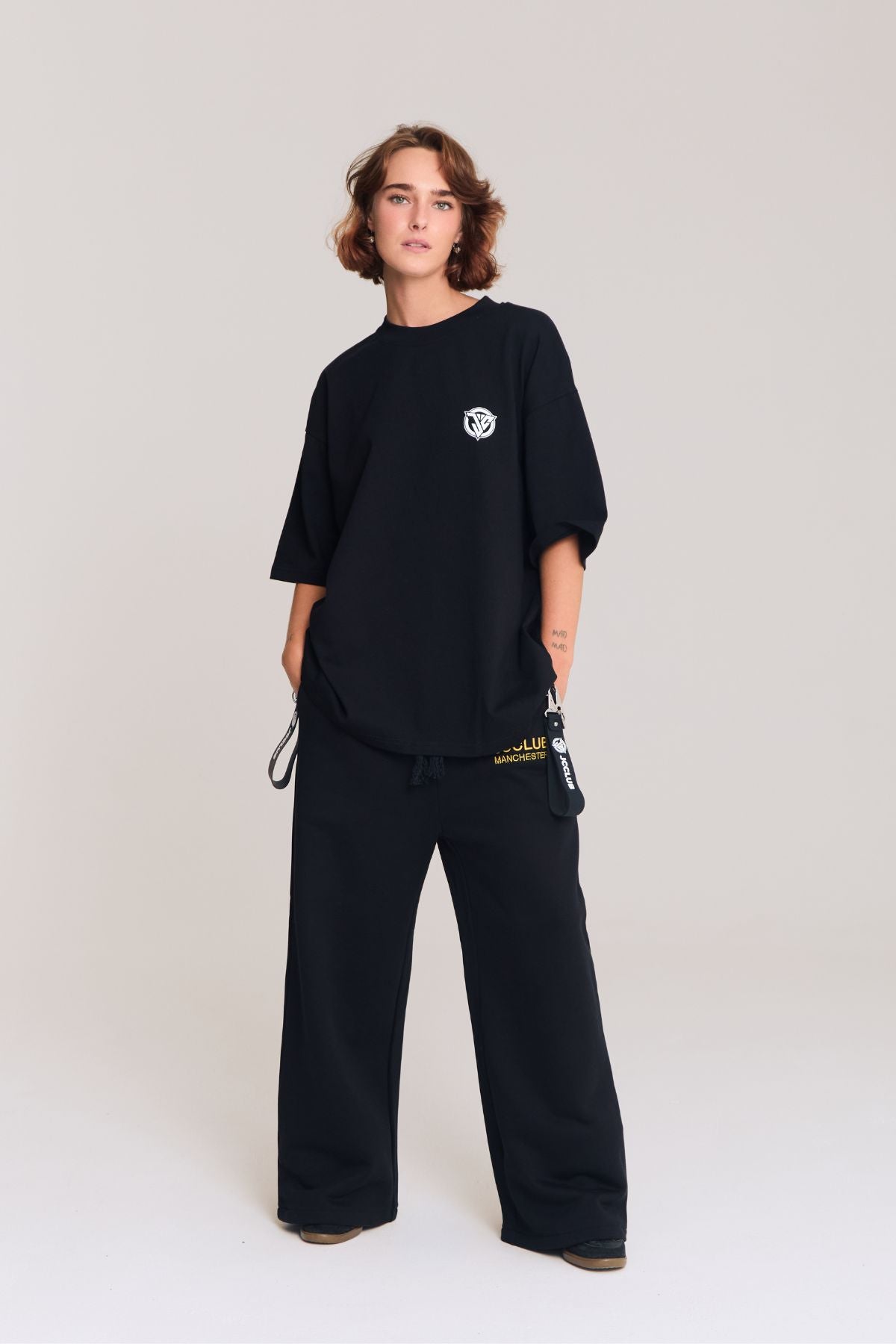 Woman wearing the black shirt