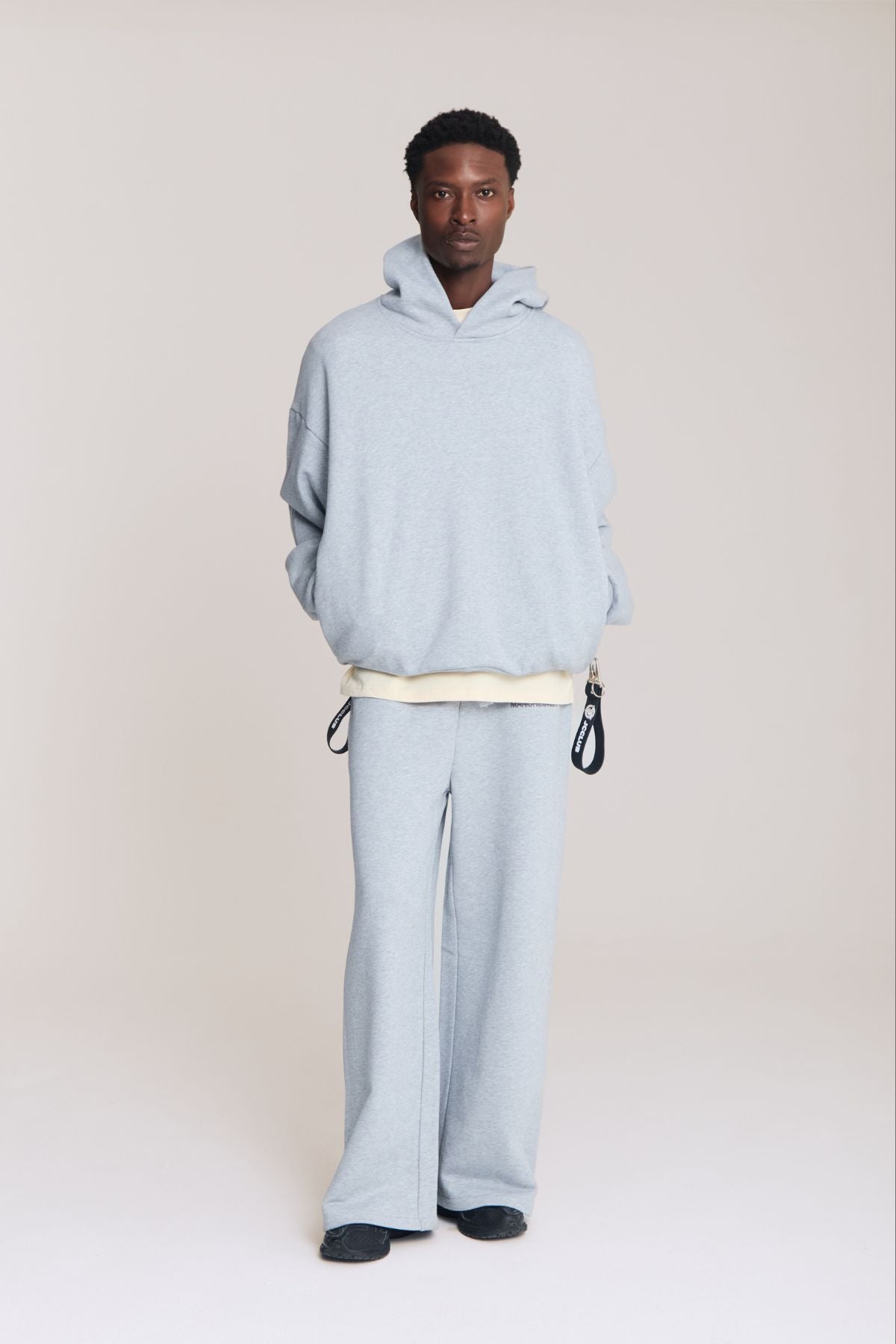 Man wearing the grey sweatpants
